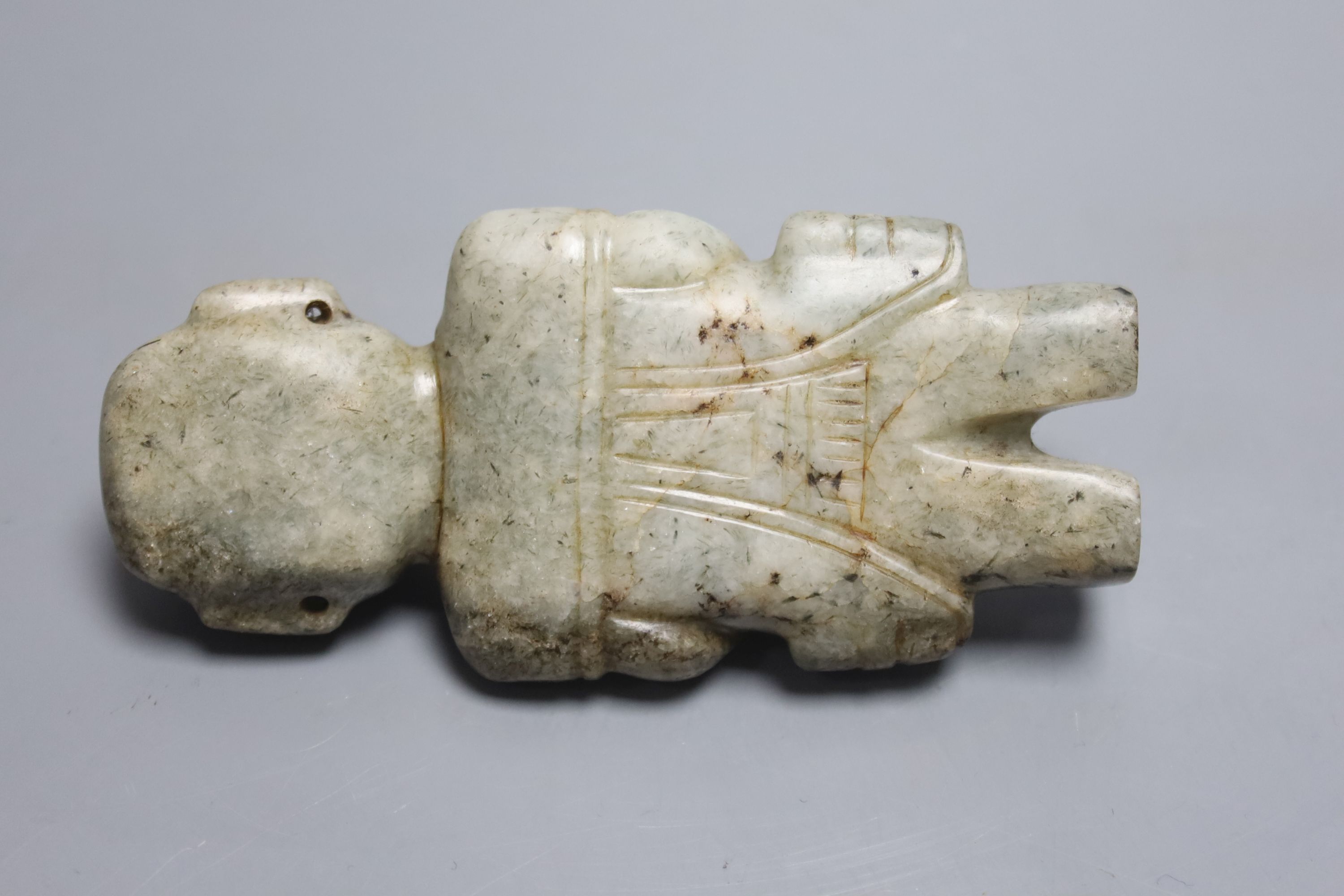 A Meso American jadeite group of a parent carrying a child, possibly Maya Culture, 200-800AD